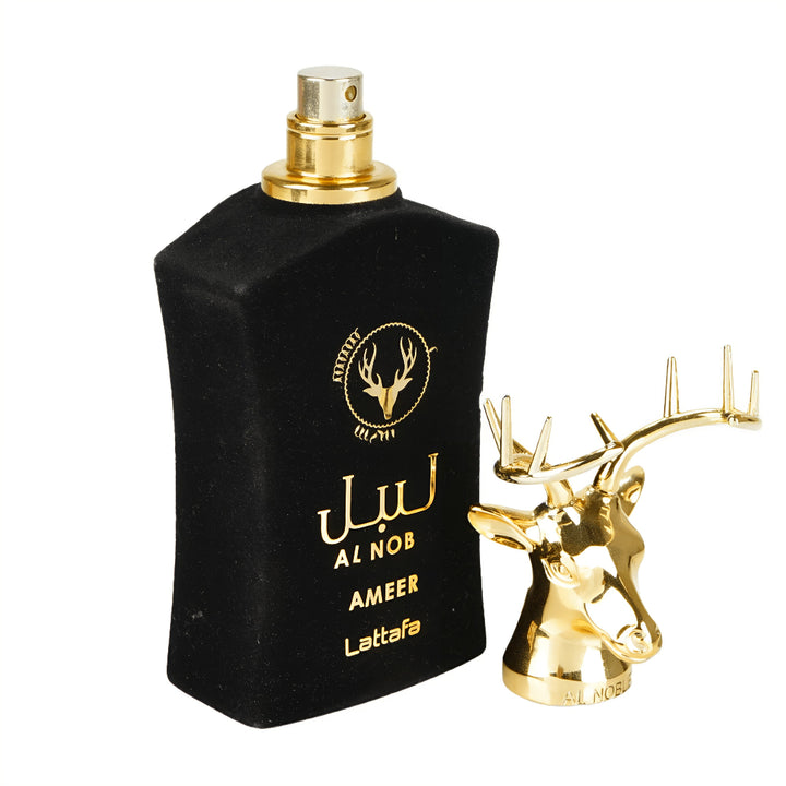 Black perfume bottle with gold accents and deer emblem on a white background lattafa perfumes