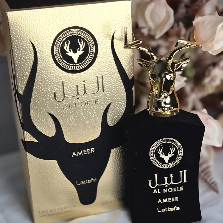 Al Noble Ameer Lattafa perfume bottle and packaging with floral background