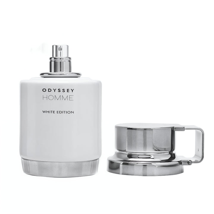 White 'Odyssey Homme' perfume bottle with silver cap and metal cap on a white background