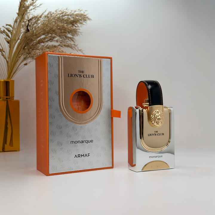 ARMF The Lion's Club monarque perfume bottle and packaging on a white background