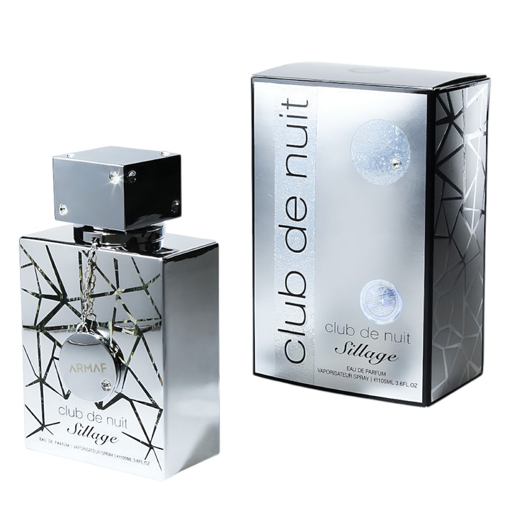 Silver and black perfume bottle and packaging with 'Club de Nuit' branding on a white background