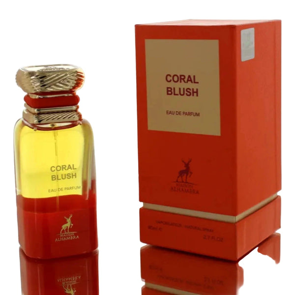 Coral Blush perfume bottle and packaging on a reflective surface