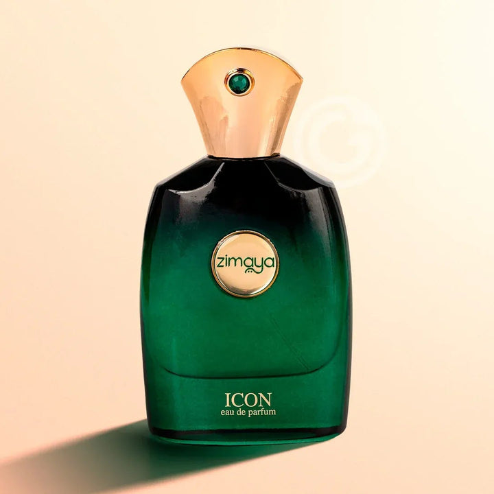 Green perfume bottle with gold cap on a beige background