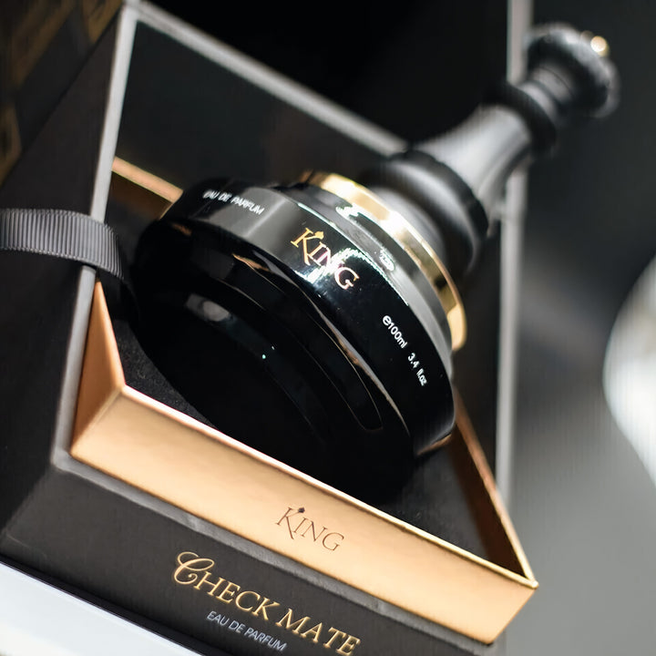 Perfume bottle labeled 'King' in a decorative box with gold accents.  King Armaf for men 100ml EDP