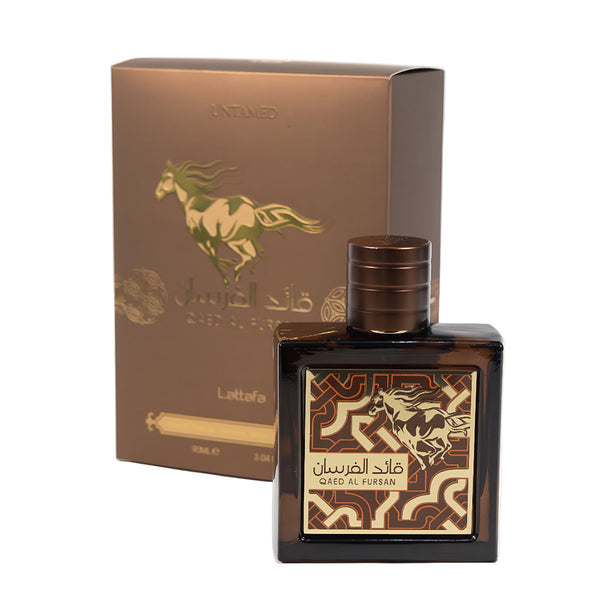 Perfume bottle and packaging with horse design on a white background Qaed Lattafa