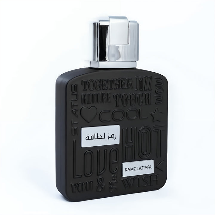 Black perfume bottle with silver cap on a white background Ramz silver