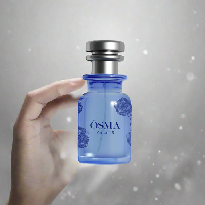 Blue Osma Amber S perfume bottle on a white background