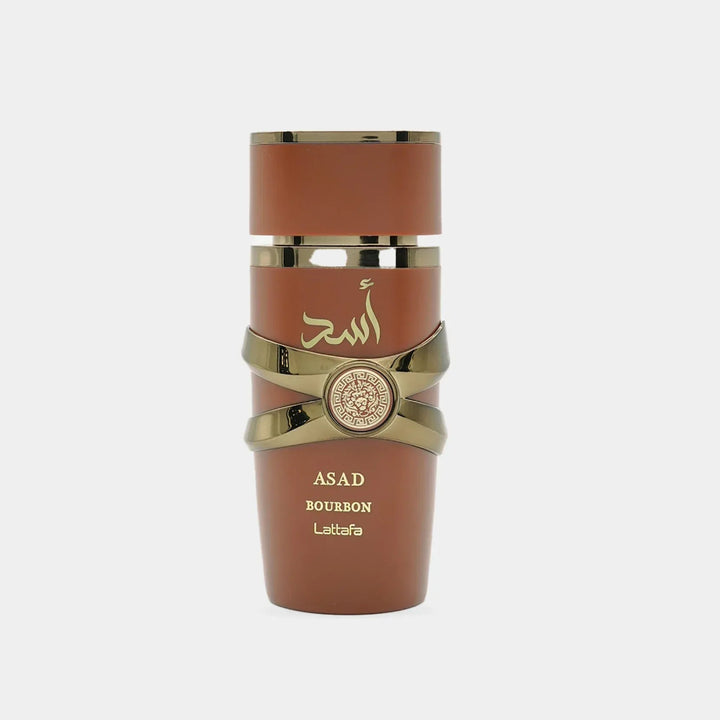 Brown and gold bottle with 'ASAD' branding on a white background