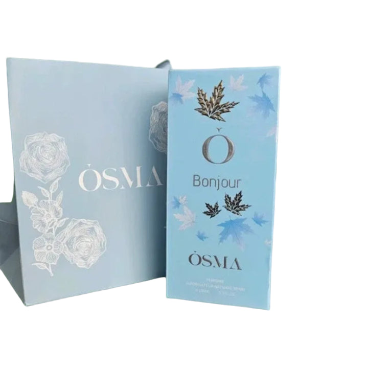 Two light blue boxes with floral designs and 'OSMA' branding on a green background