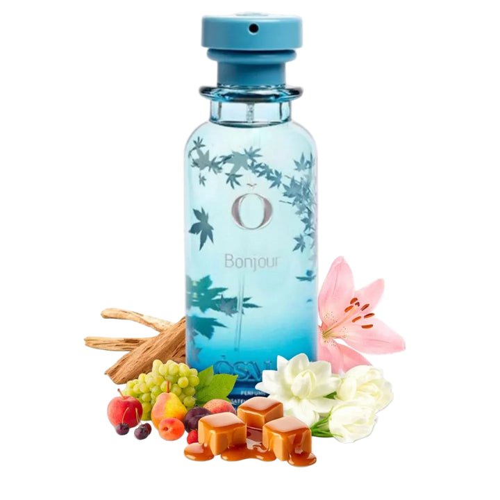 Blue bottle with floral design on a white background, surrounded by flowers and fruits.