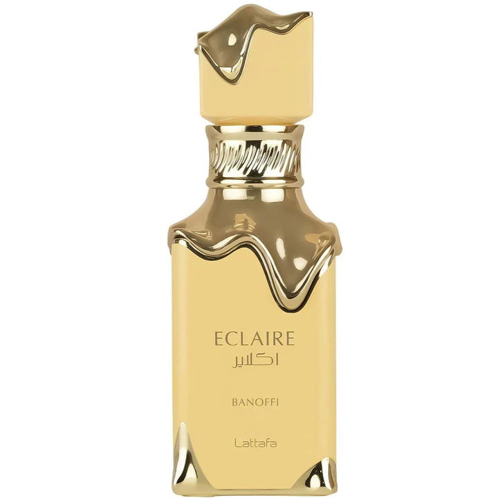 Gold perfume bottle with 'Eclaire' branding on a white background