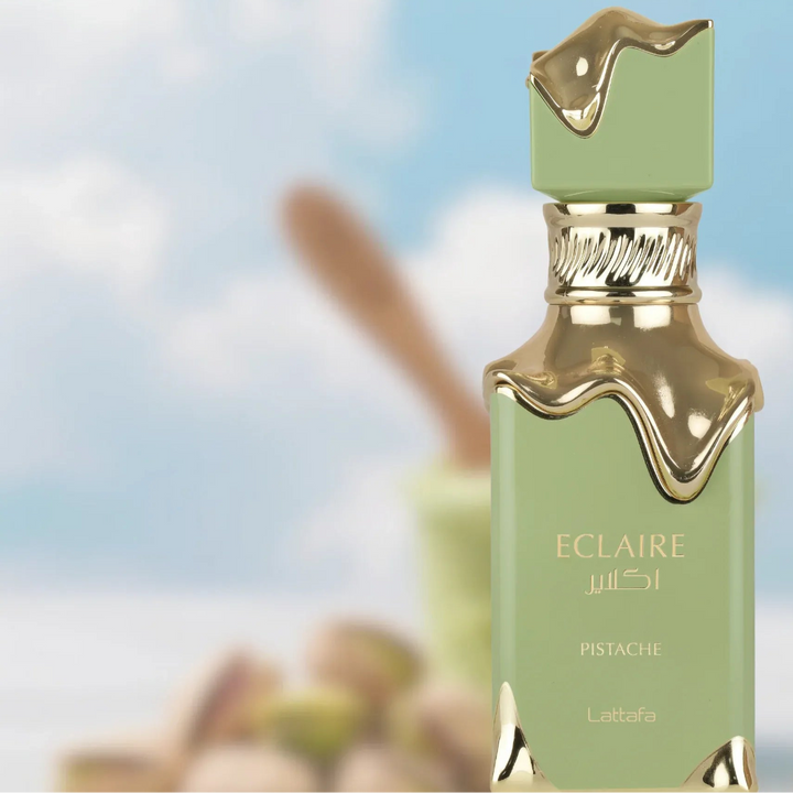 Two Eclaire Pistache & Banoffi perfume bottles with a blurred dessert and banana background.