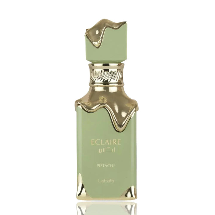 Green perfume bottle with gold accents on a white background