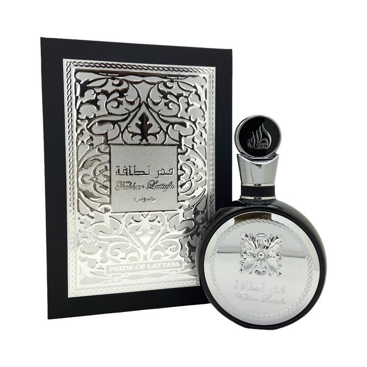 Lattafa fakhar silver Perfume bottle with decorative packaging on a white background