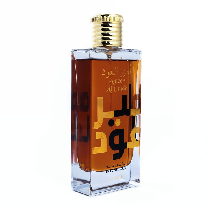 Perfume bottle with gold cap and Arabic text on a white background lattafa perfume ameer al oudh