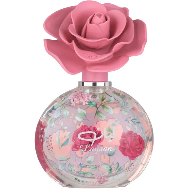 Perfume bottle with pink rose design on a white background