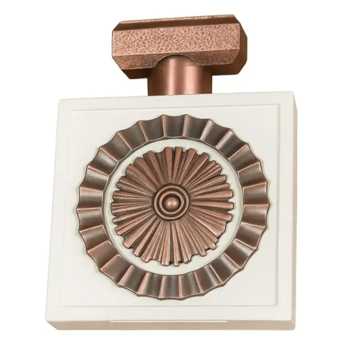 Decorative wall piece with rose gold and white design on a white background
