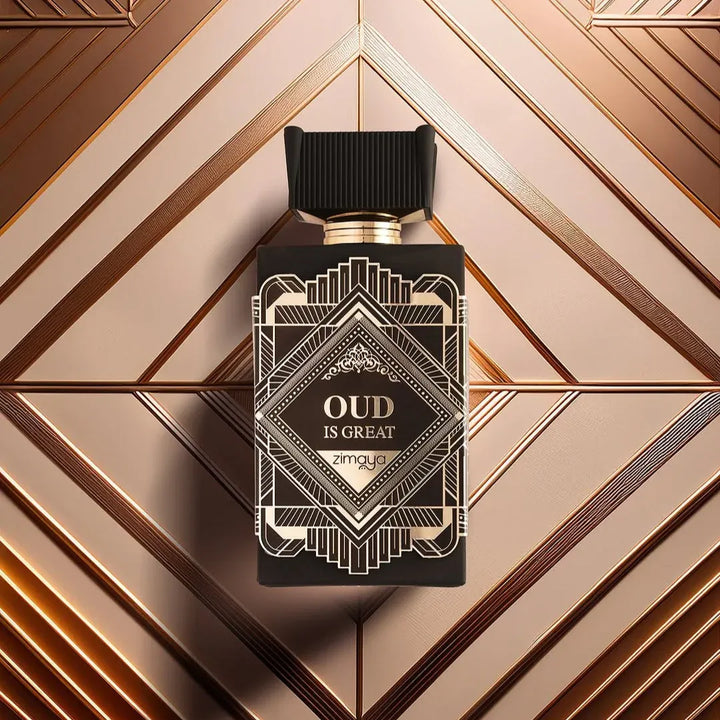 Perfume bottle with 'Oud is Great' text on a geometric patterned background