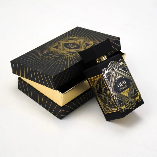 Black and gold box with geometric design on a white background