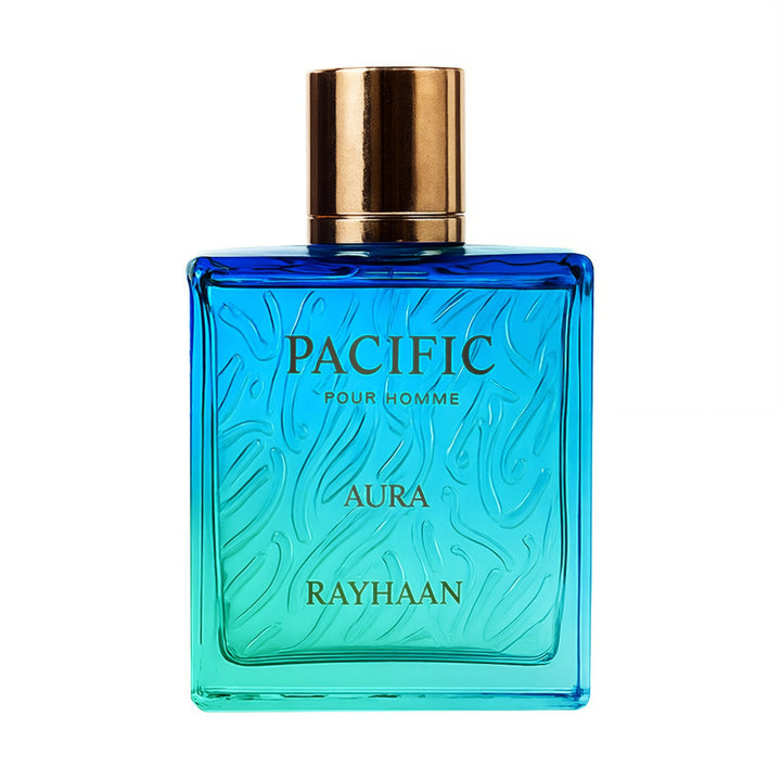 Blue perfume bottle with gold cap on a white background rayhaan perfumes pacific aura