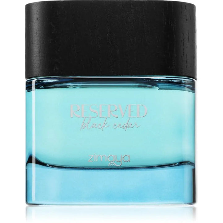 Blue perfume bottle with black cap on a white background