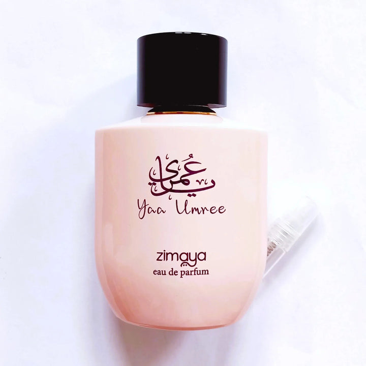Perfume bottle with 'zimaya' branding on a white background