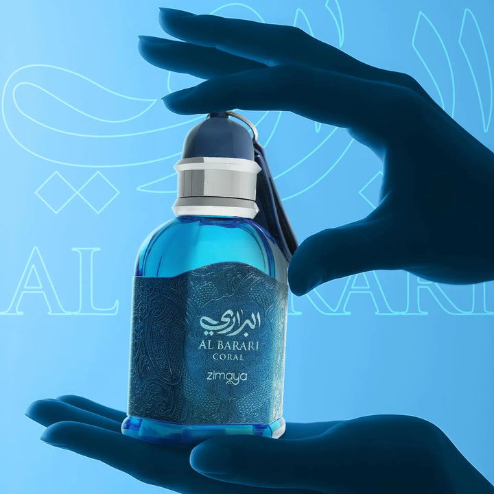 Hand holding a blue perfume bottle against a blue background with 'Al Haramain' branding.