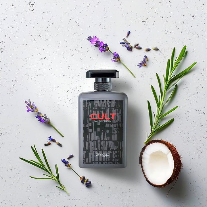 zimaya Cult perfume bottle with lavender, rosemary, and a coconut on a light background