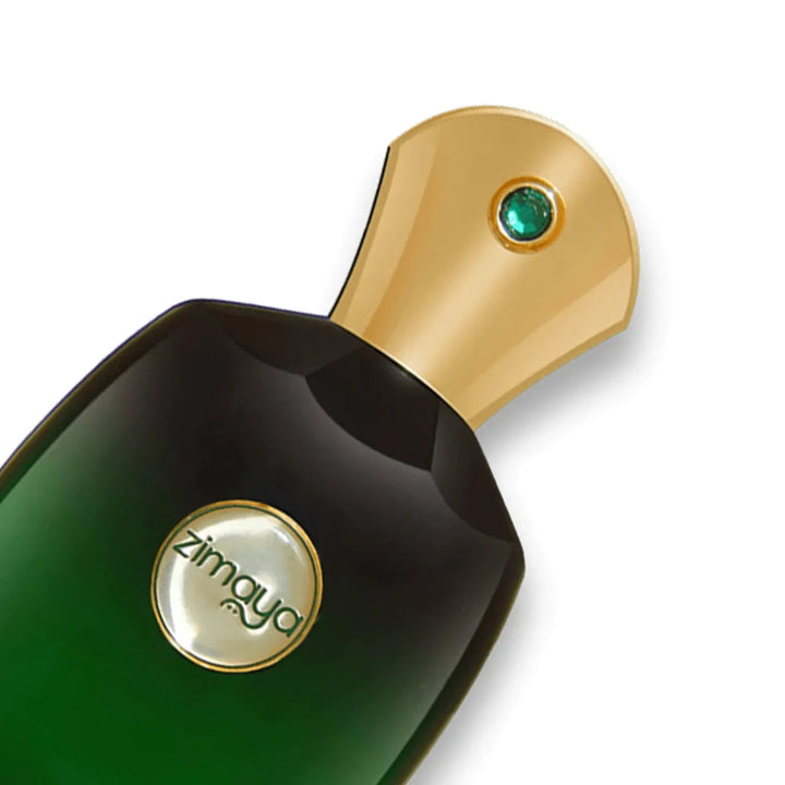 Green perfume bottle with gold cap and 'zimaya' logo on a white background